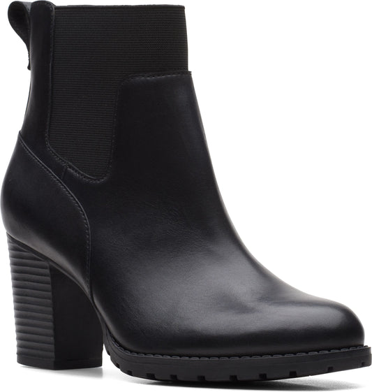 Black heeled ankle boot with elastic gore at the ankle.