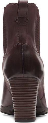 Dark brown heeled boot with elastic side panel.