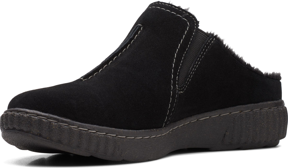 Black suede mule with faux fur lining and a low, textured sole.