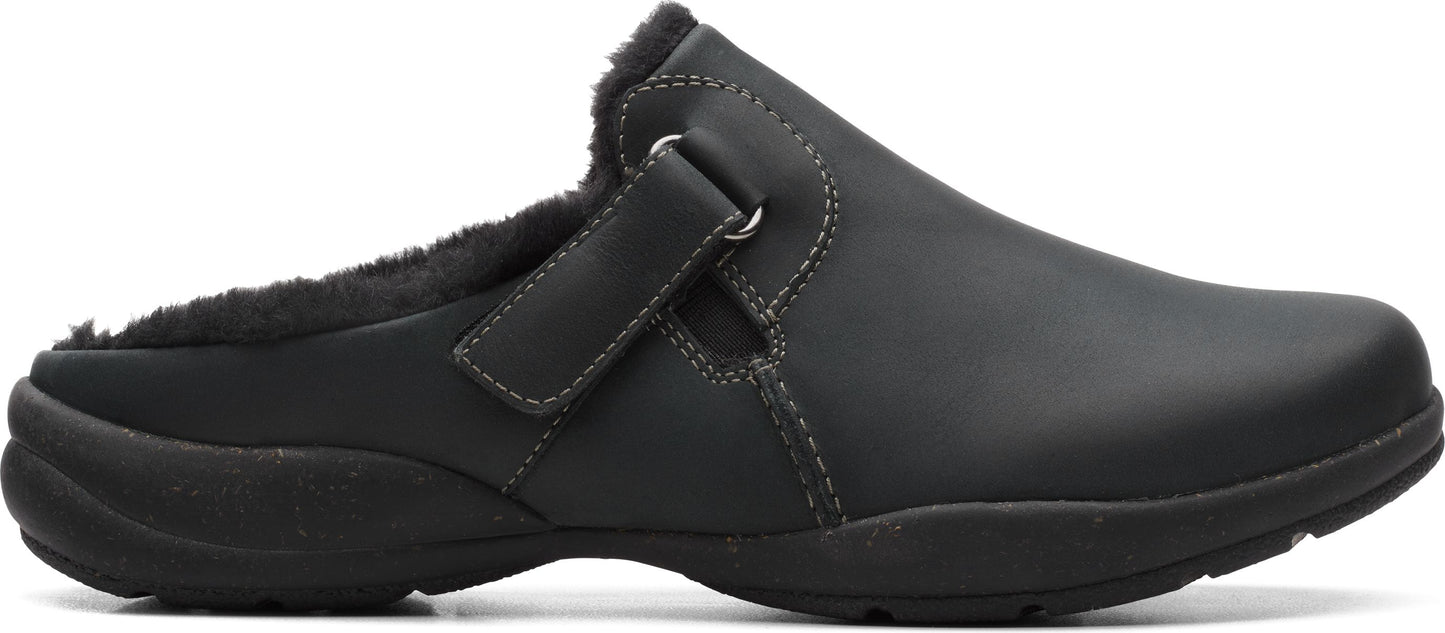 Black slip-on shoe with faux fur lining and hook-and-loop strap.