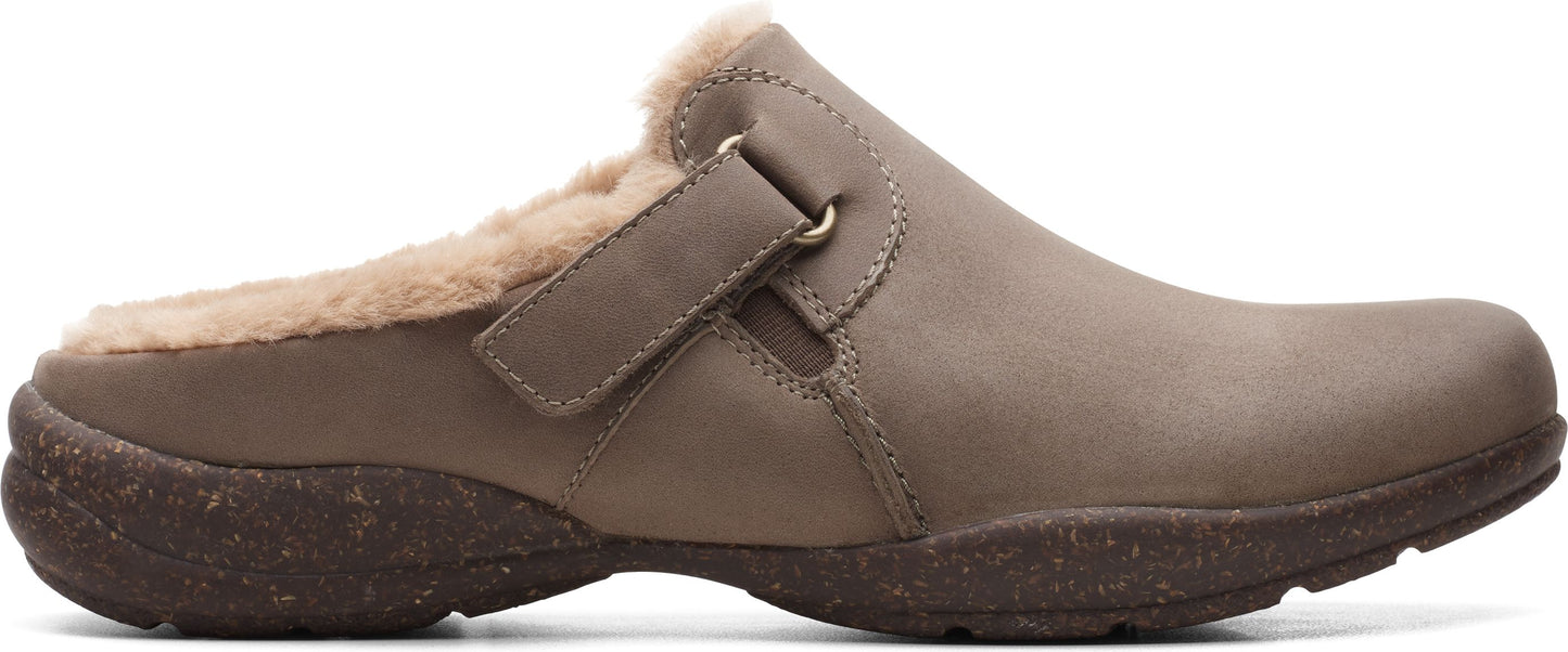 Taupe clog style shoe with fuzzy lining and adjustable strap.