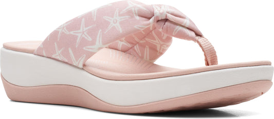 Pink sandal with starfish pattern and white sole.