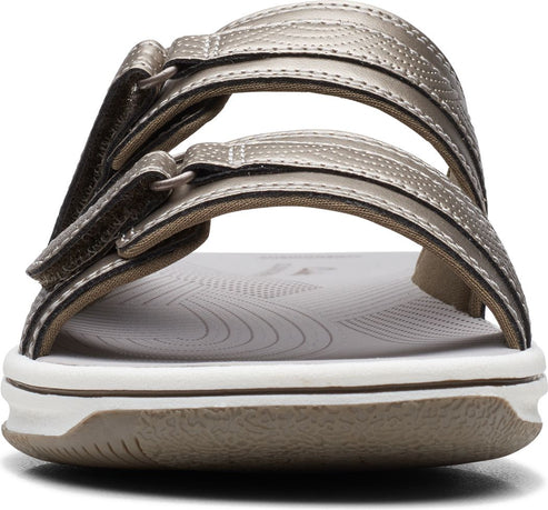 Front view of a bronze sandal with two adjustable straps.