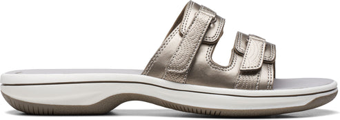 Metallic slide sandal with three velcro straps.