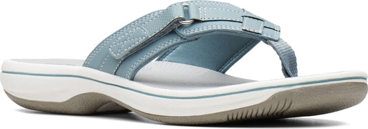 A light blue sandal with a white and gray sole.