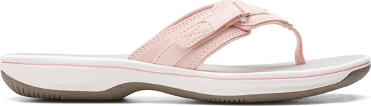 a pink sandal with velcro closure