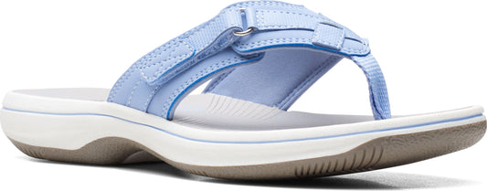 Light blue sandal with velcro straps and a white sole.