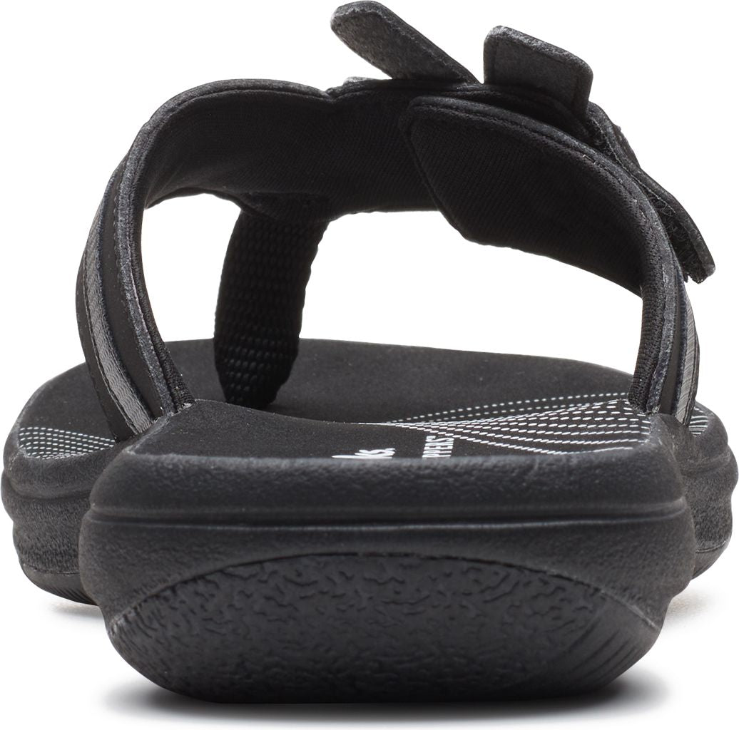 Black sandal with adjustable hook and loop straps.