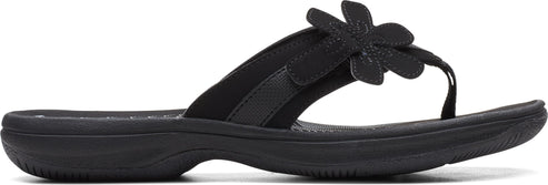 Black flip-flop sandal with flower detail.