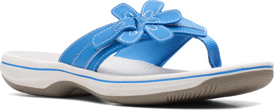 Blue thong sandal with a flower.