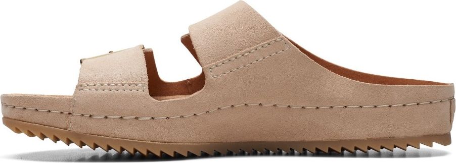 A light beige sandal with two straps and a textured sole.
