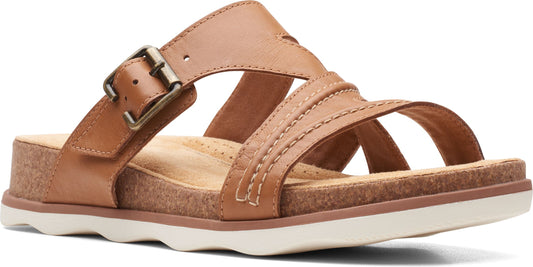 Tan leather sandal with decorative stitching, straps, and buckle closure.