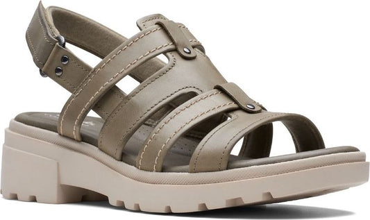 Olive green leather sandal with multiple straps, a buckle at the ankle, a lug sole and a block heel.