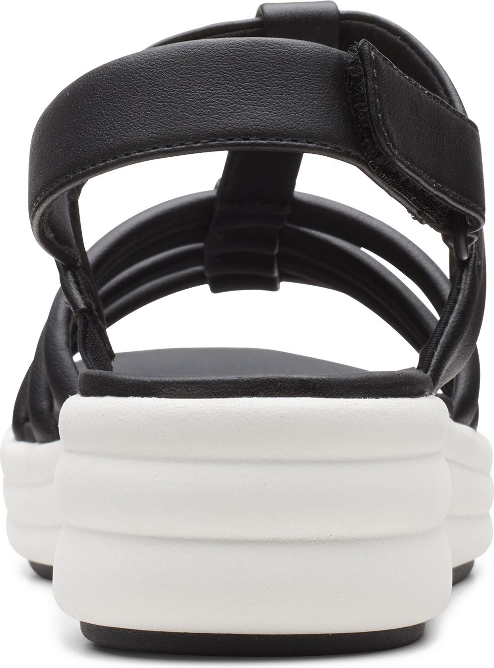 Back of a black sandal with horizontal straps and a white platform sole.