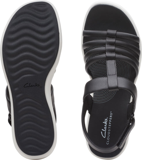 Black leather sandals with a white sole; the insole has "Clarks CLOUDSTEPPERS" printed on it.