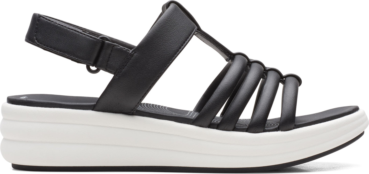 A black sandal with an adjustable strap and a white platform sole.