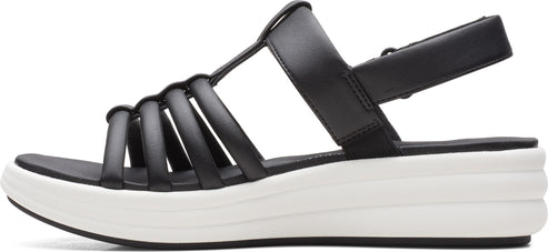 A black strappy sandal with a white platform sole.