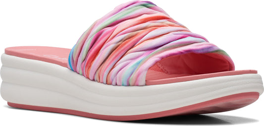 A multicolored textile slide sandal with a chunky white sole.