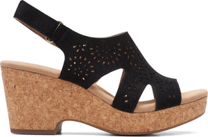 Black wedge sandal with laser cut design and cork heel