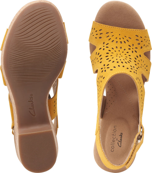 Overhead view of two yellow open-toed sandals. One shows the sole with a wavy pattern and the logo "Clarks." The other shows the perforated sandal top, insole with "Collection by Clarks" printed, and buckle closure.