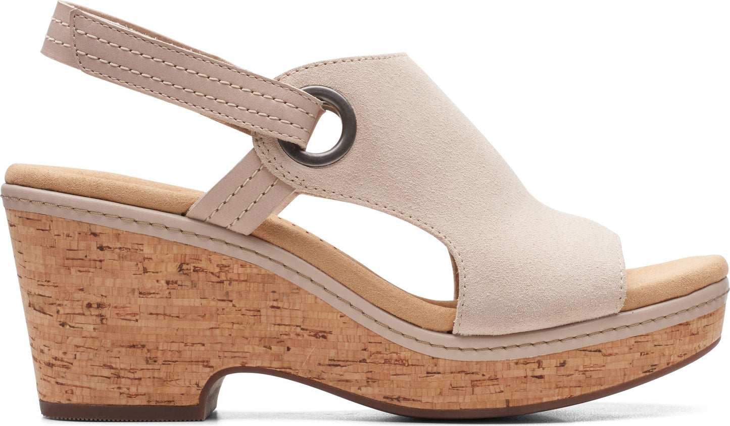 Beige wedge sandal with cork heel and slingback strap.