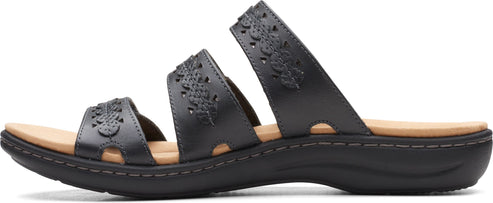 Black sandal with three straps and floral cutout design.