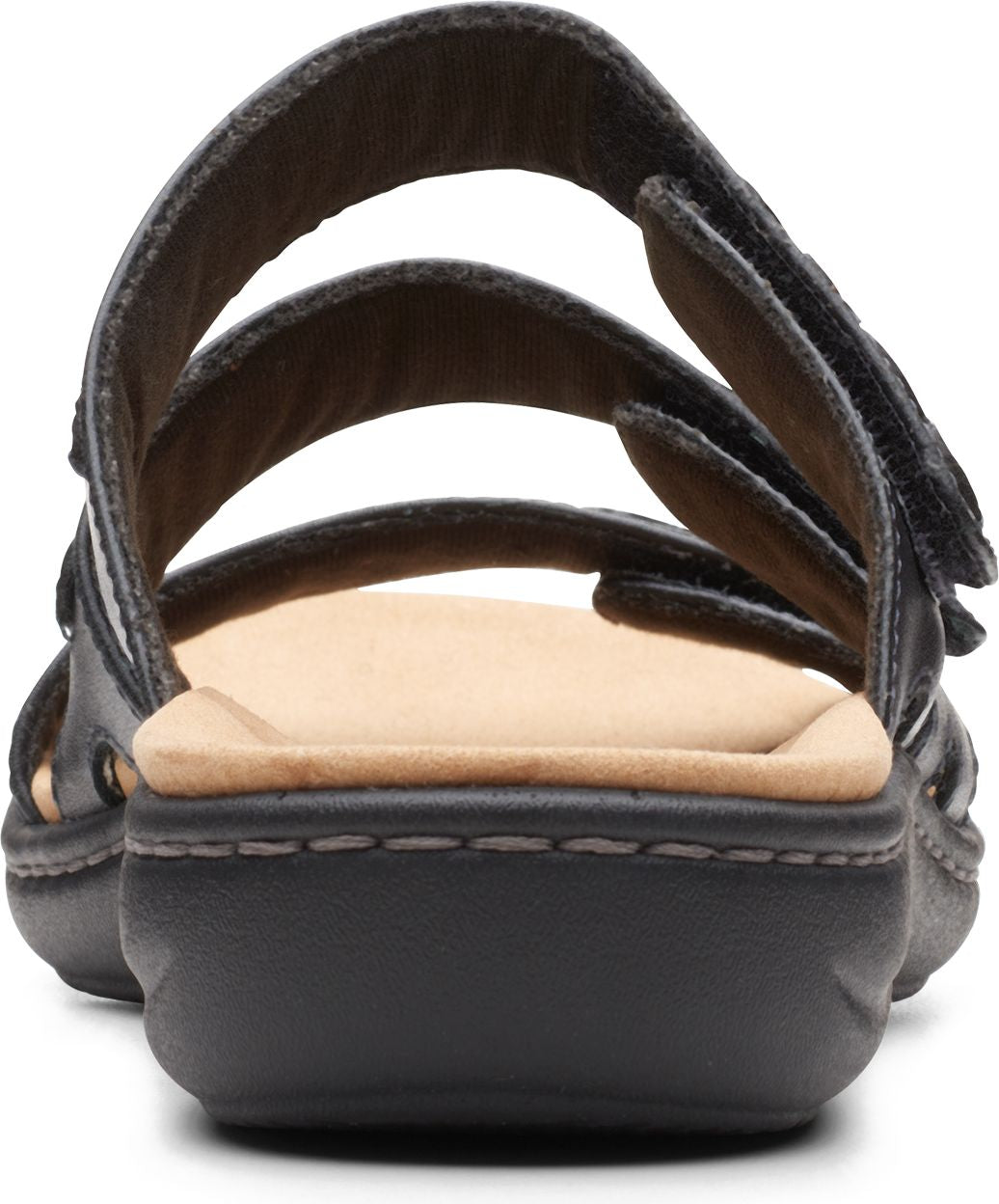 Back view of black sandals with multiple adjustable straps and a tan footbed.