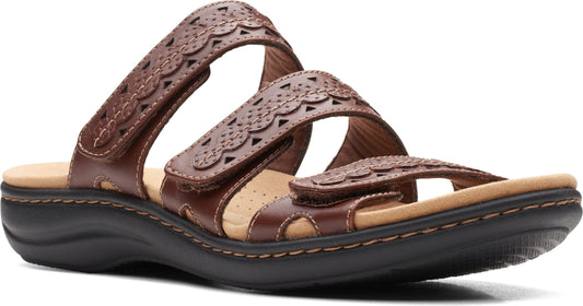 Brown leather sandal with three hook-and-loop straps featuring decorative cutouts.
