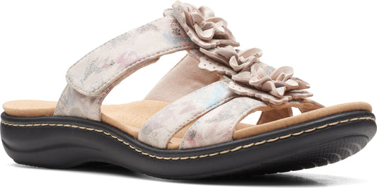 Sandal with flower accents on straps.