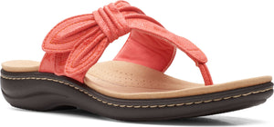 Coral-colored sandal with a thong toe and bow detail.