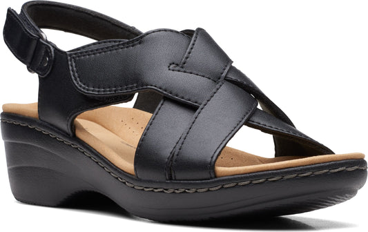 Black leather sandals with crisscrossing straps and a wedge heel.