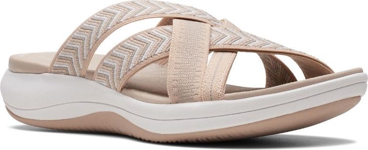 Beige slide sandal with zigzag pattern straps.