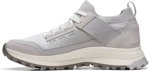 A gray low-top sneaker with a knit upper and lace-up closure.