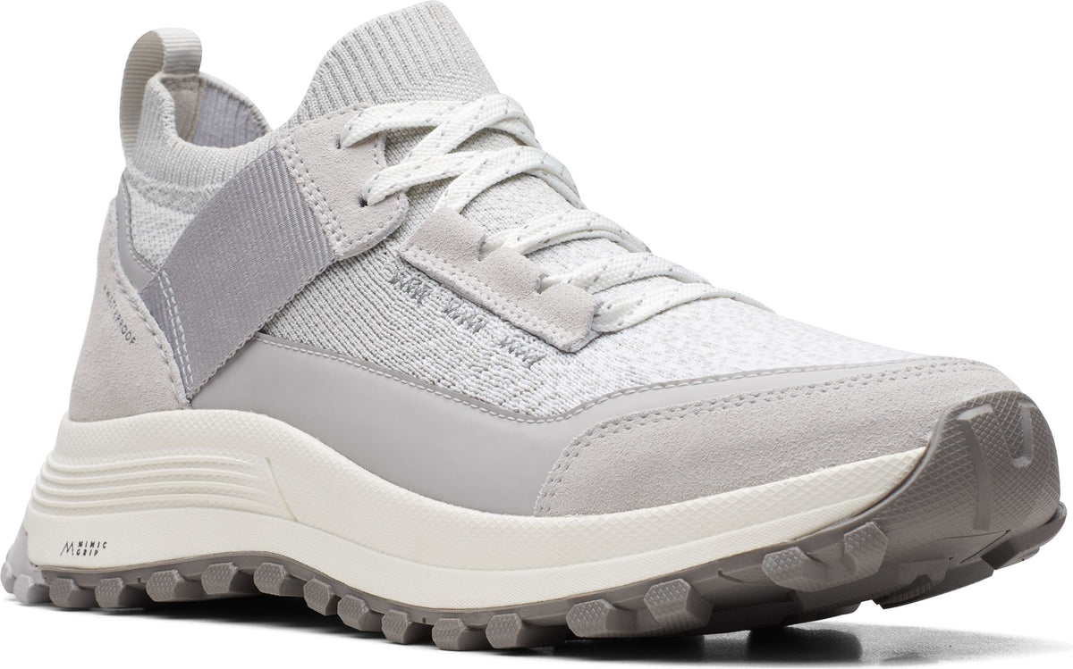 A light gray knit upper sneaker with a light gray rubber sole.