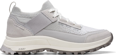 A low top light gray shoe with white laces.