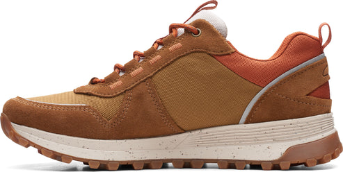 Brown sneaker with orange laces and trim, and a white and brown sole.