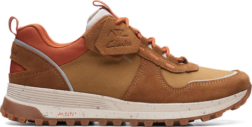 Brown trail running shoe with orange accents and a textured sole.