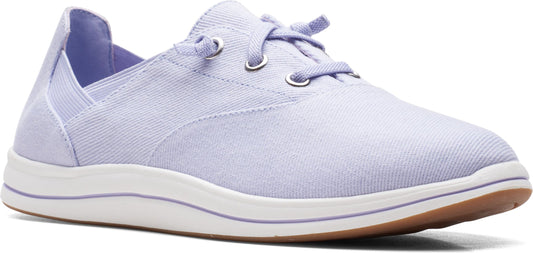 A light purple canvas shoe with white soles and a brown bottom.