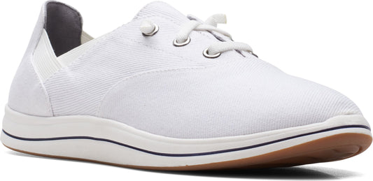 A white canvas shoe with laces.