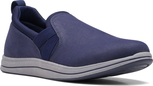 Navy slip-on shoe with elastic panels and grey sole.