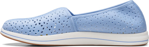 A light blue slip-on shoe with decorative perforations.