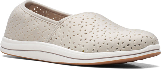 Beige slip-on shoe with geometric pattern cutouts.
