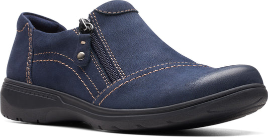 Navy leather slip-on shoe with side zipper and contrast stitching on a black sole.