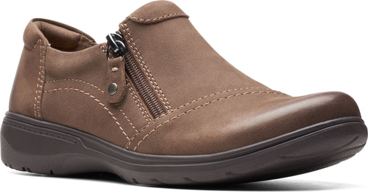 Taupe slip-on shoe with side zipper and moccasin-style stitching.