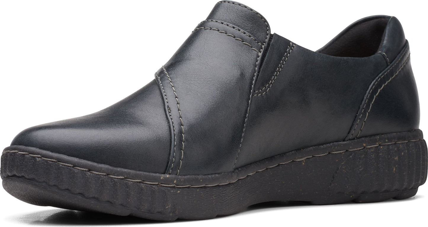 Dark blue leather slip-on loafer shoe with a thick, dark sole.