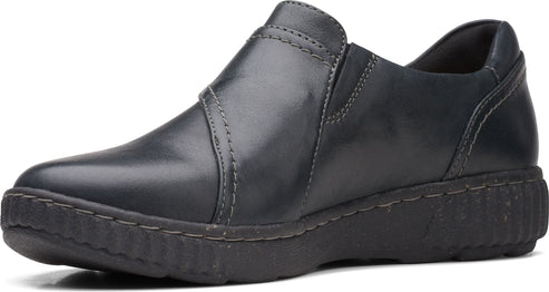 Dark blue leather slip-on loafer shoe with a thick, dark sole.