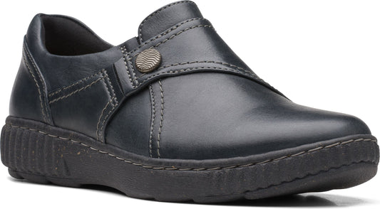 Dark blue leather slip-on shoe with button detail and a thick black sole.