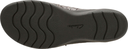 The sole of a shoe with a wavy tread pattern and a logo that says "Clarks".