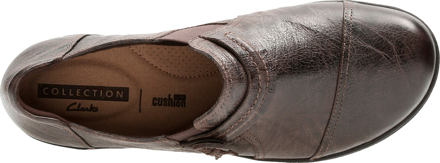 A brown leather shoe with a cushioned insole, seen from above.