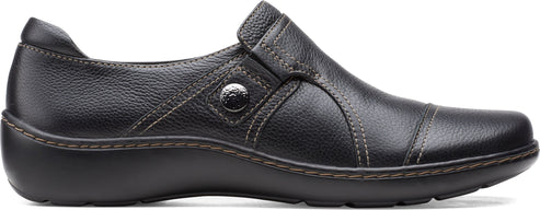 A black leather slip-on shoe with a rounded toe and a decorative button.